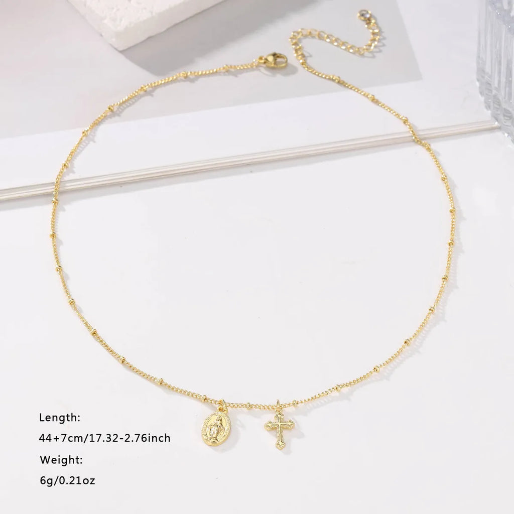 Gold geometric cross necklace with Virgin Mary ornament for women