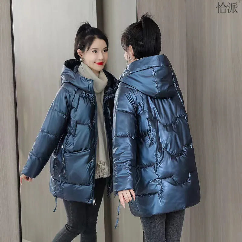 Women's loose fit hooded winter jacket in polyester blend available in four colours with Asian sizing.