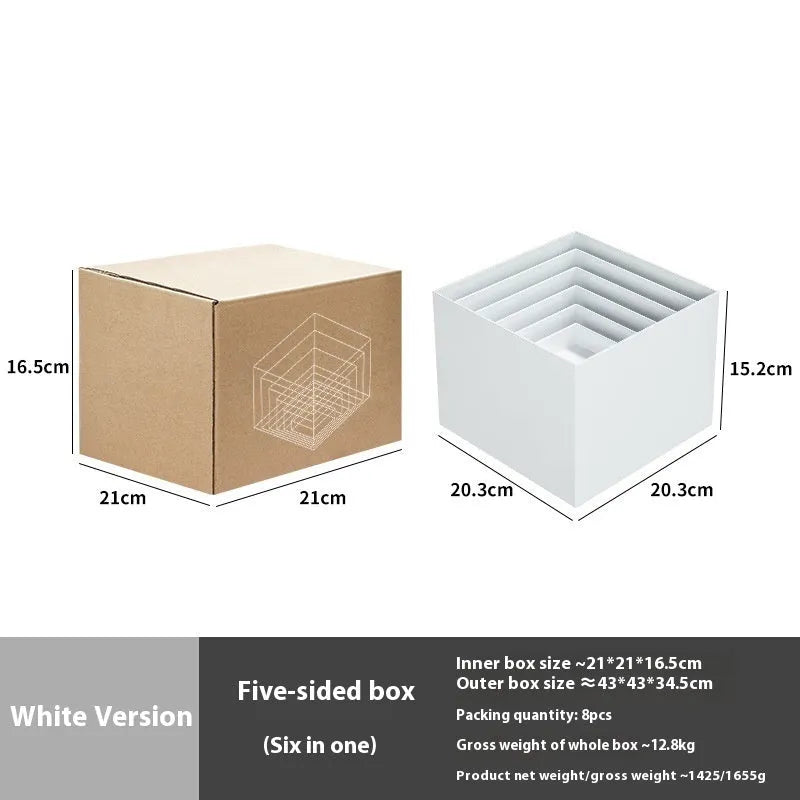 Set of six white plastic cube units forming a tiered desktop dessert display stand.