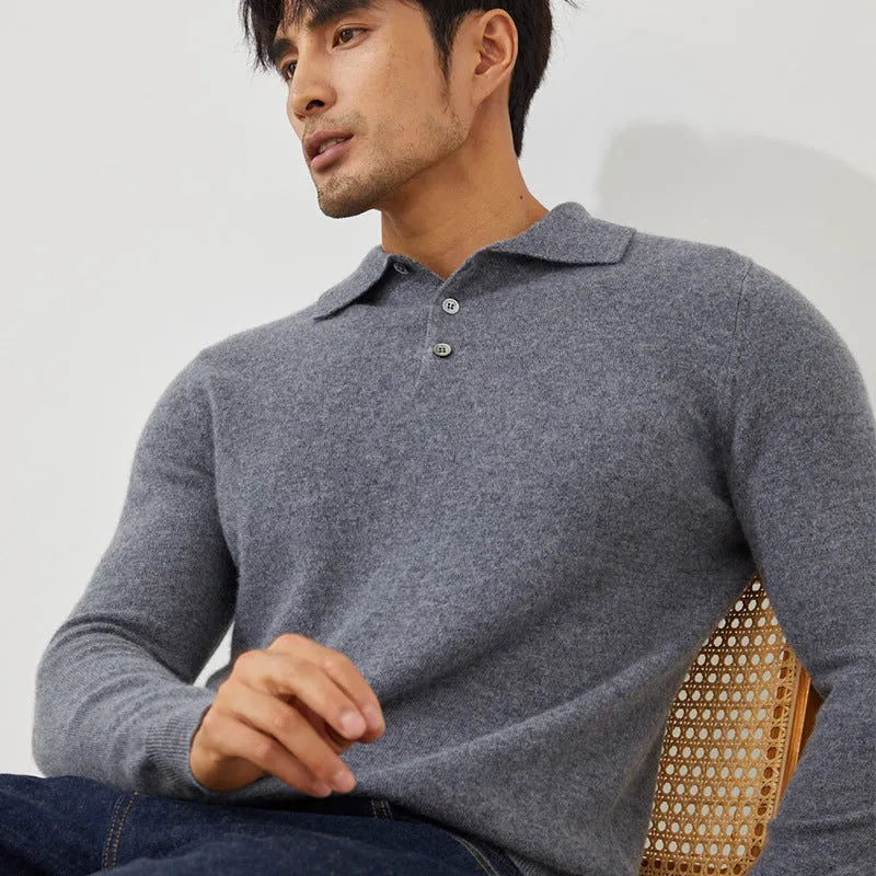 Man wearing a sapphire blue cashmere polo collar pullover sweater with a loose fit.