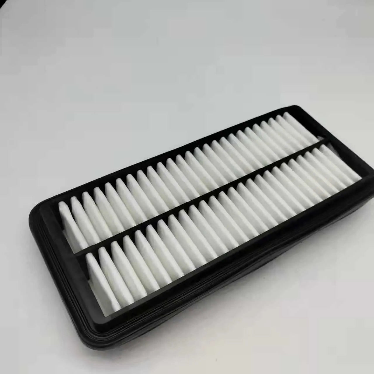 Black car air filter with 256mm x 113mm x 40mm dimensions for modern vehicle replacement