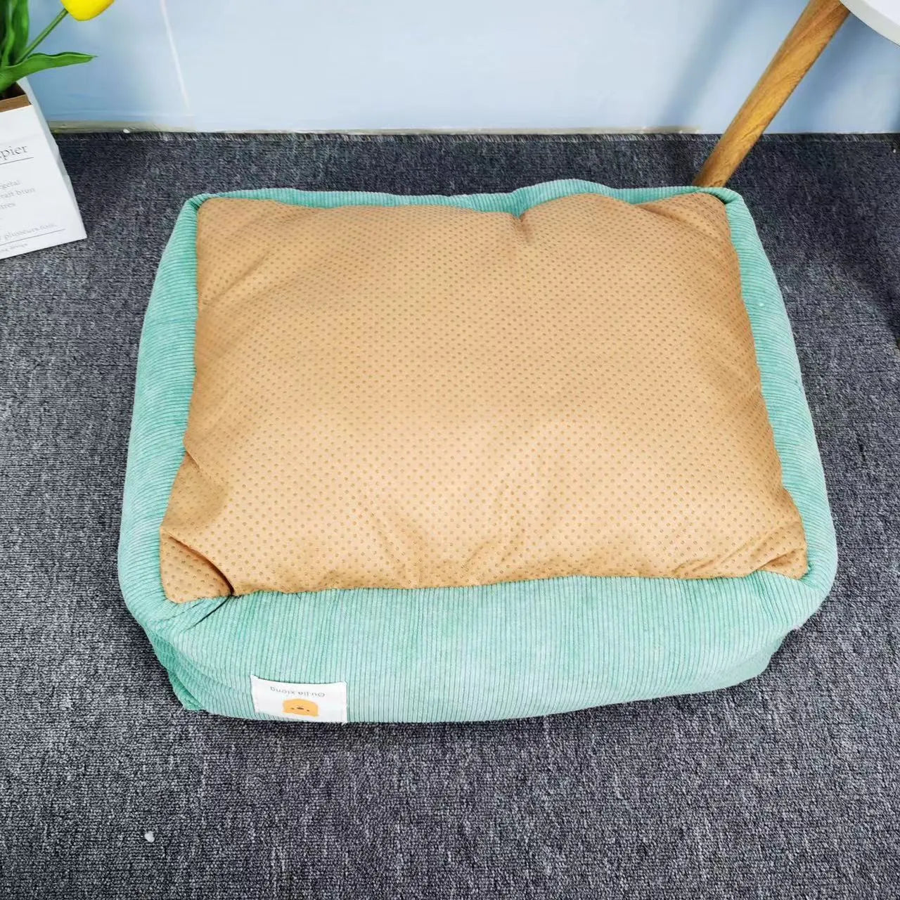 Cotton fabric dog nest in light blue, filled with PP cotton, shown in a 50x40cm size.