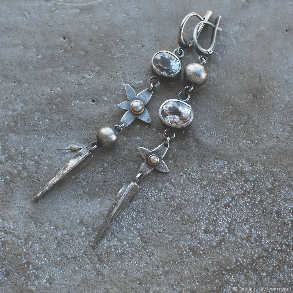 Geometric antique silver long drop earrings with rhinestones and a XINGX design motif.