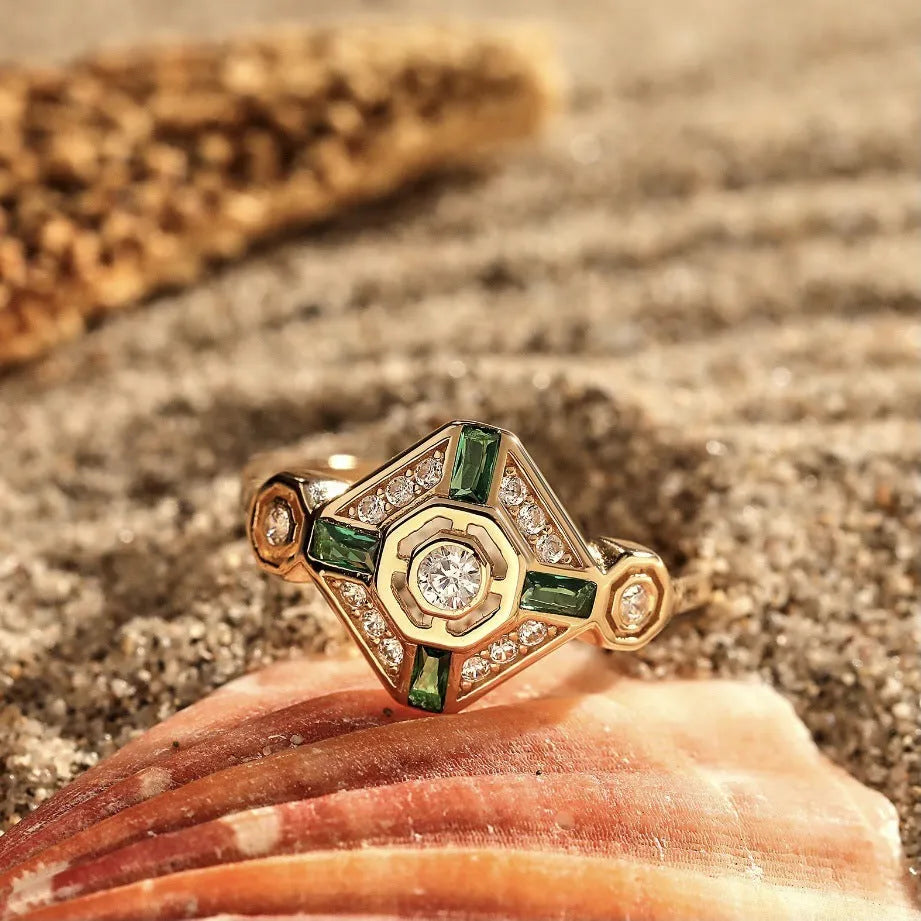 Square geometric women's ring in lvzuan green colour on a white background.