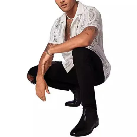 Man modelling a black short-sleeved knitted button shirt with jacquard texture