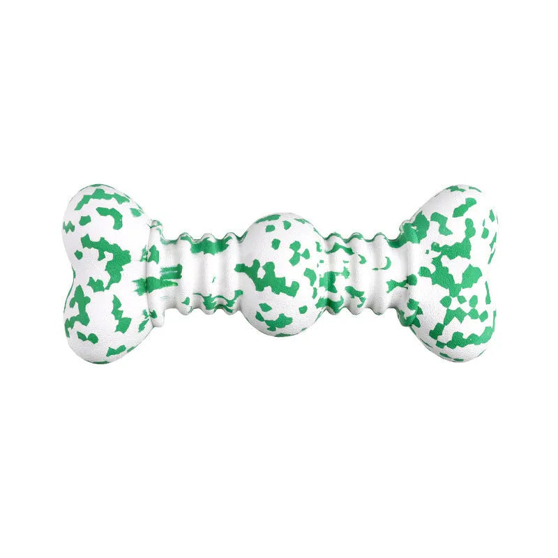 Green, white, and yellow camouflaged natural rubber bone chew toy for large dogs on a plain background.