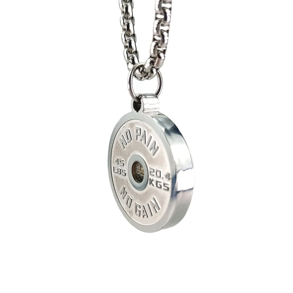 Polished stainless steel barbell disk pendant on a 60cm chain, a fitness-inspired geometric necklace.