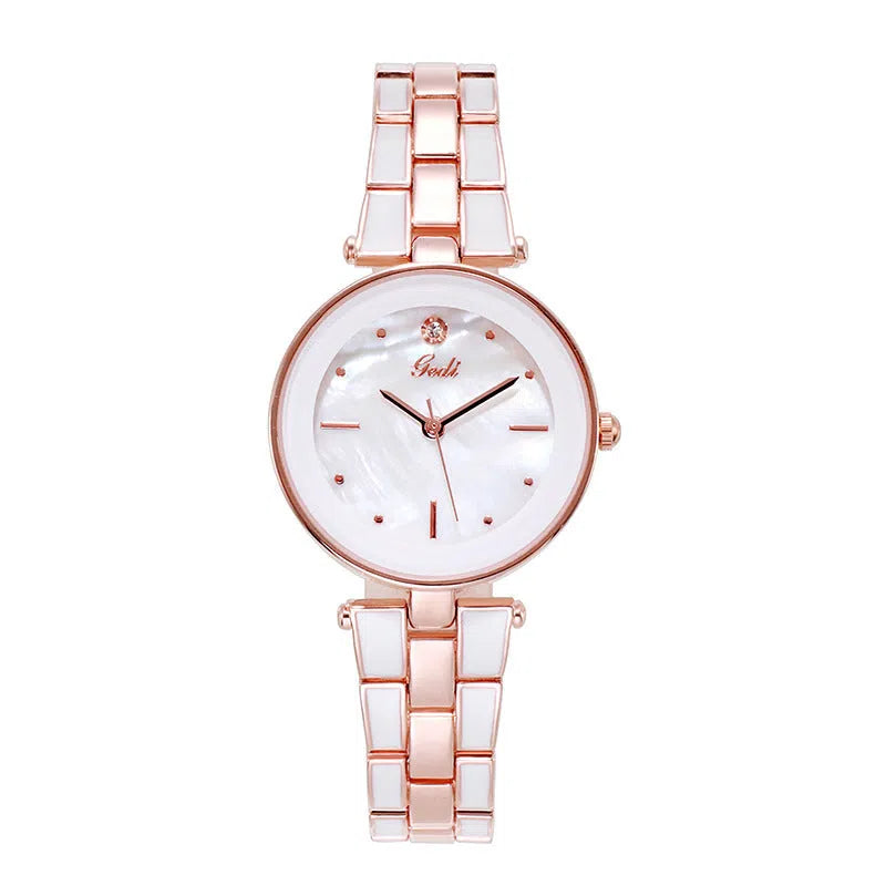 Ladies quartz watch with white round dial, steel strap, and rose gold sheen on a plain background
