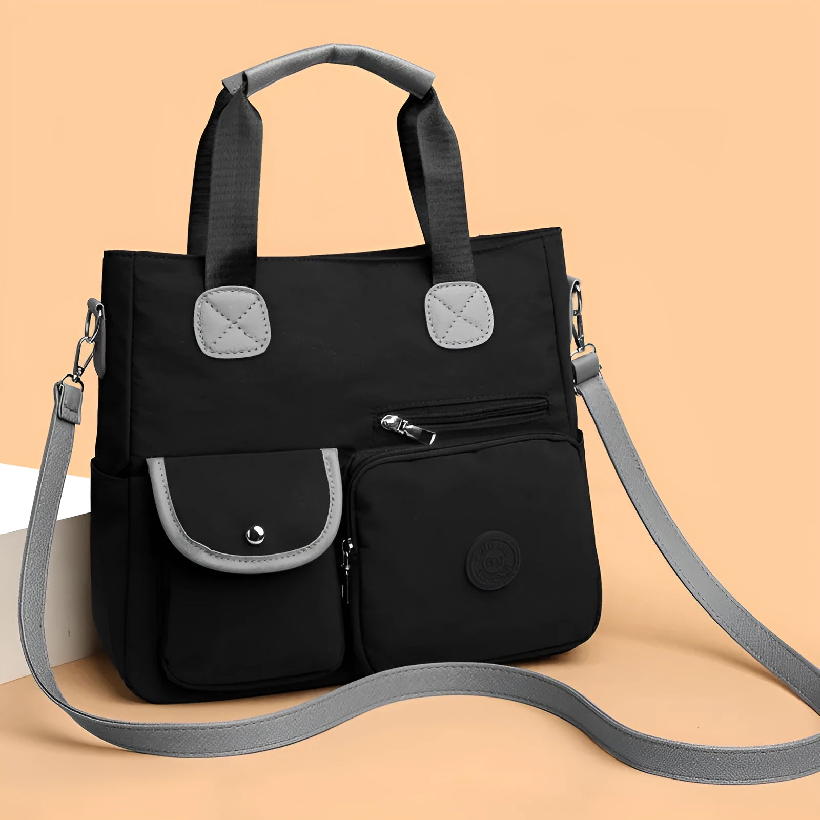 Women's nylon large-capacity crossbody bag in black with organised compartments and single shoulder strap