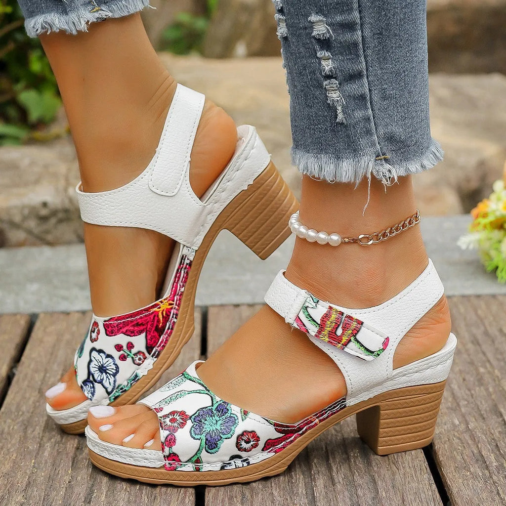 White women's high-heel casual sandals with an adjustable Velcro strap buckle.