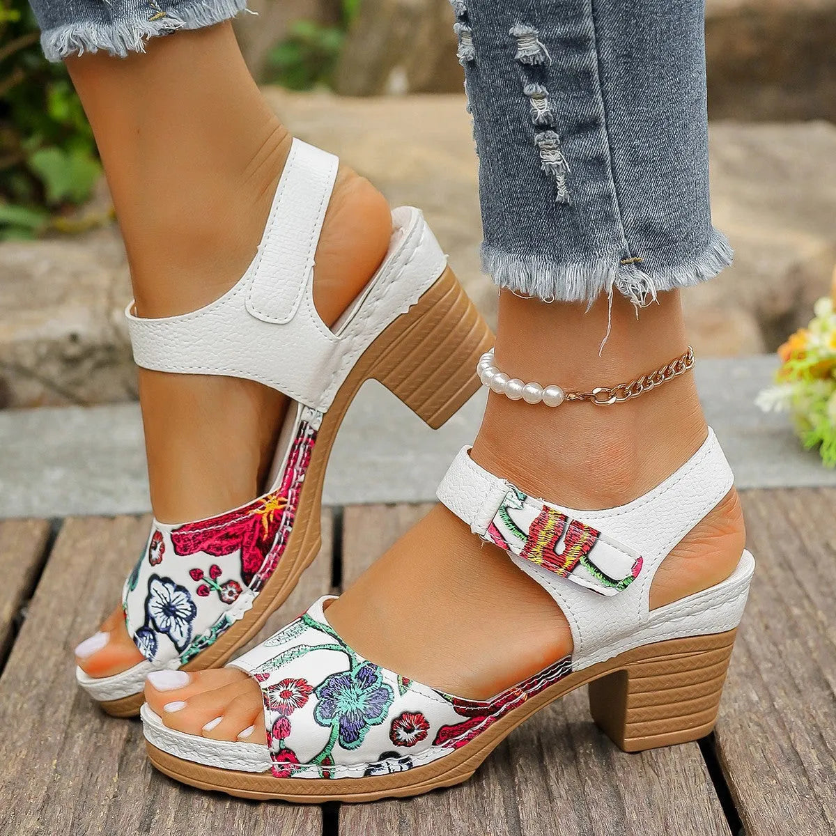White women's high-heel casual sandals with an adjustable Velcro strap buckle.