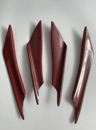 Set of four ABS plastic bumper blades for car styling in carbon fibre finish