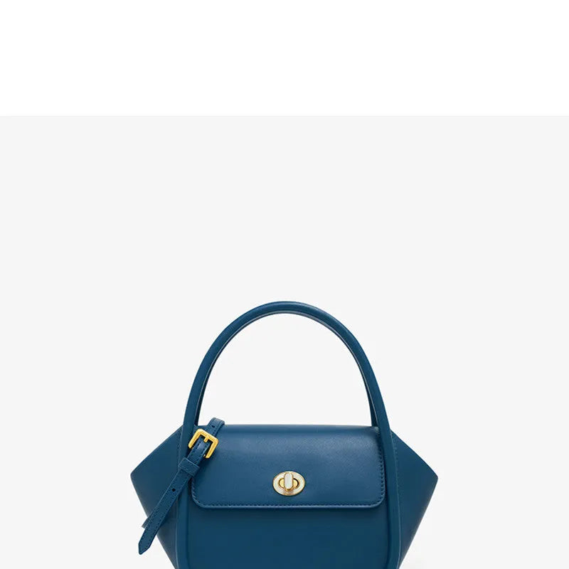 Women's leather wing tote handbag with cross-body strap and hard handle in cow leather
