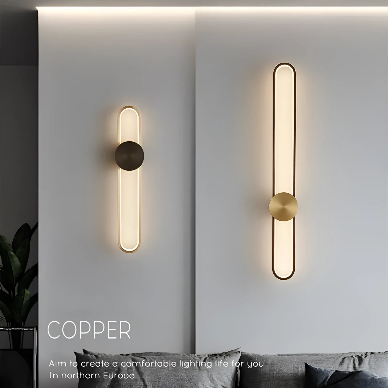 Round modern minimalist wall lamp with iron shade in black or gold finish.
