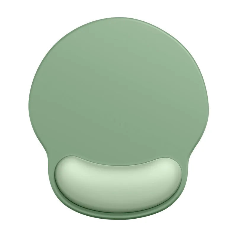 Silicone mouse mat with wristband in a gradient blue colour pattern on a desk.