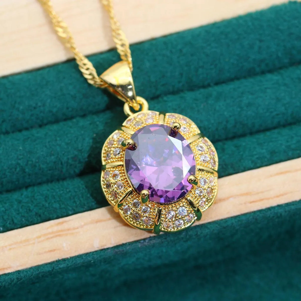 18k gold plated jewellery set with cubic zirconia stones showing necklace, earrings, ring and bracelet