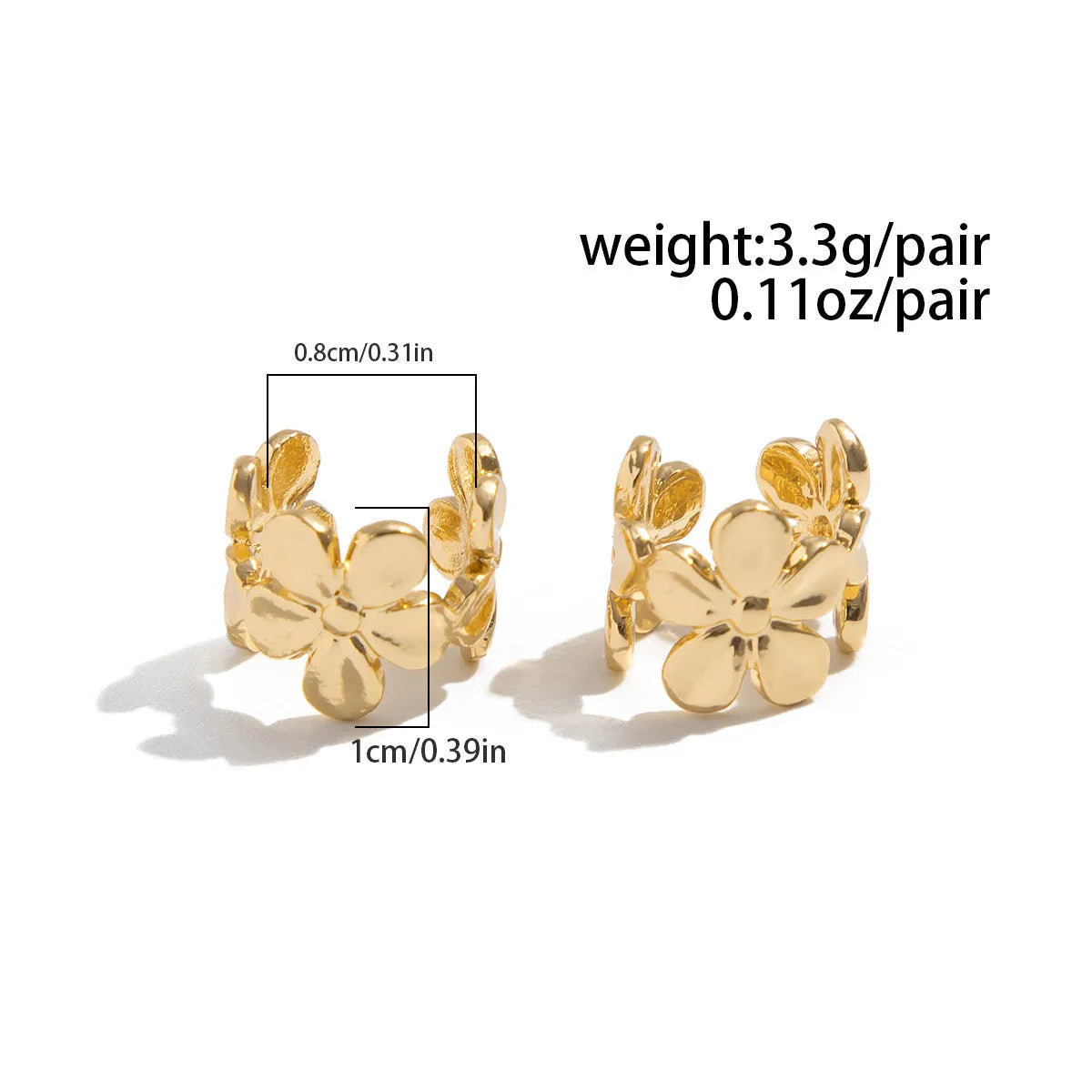 Gold starfish and conch shell earrings for women on a white background.