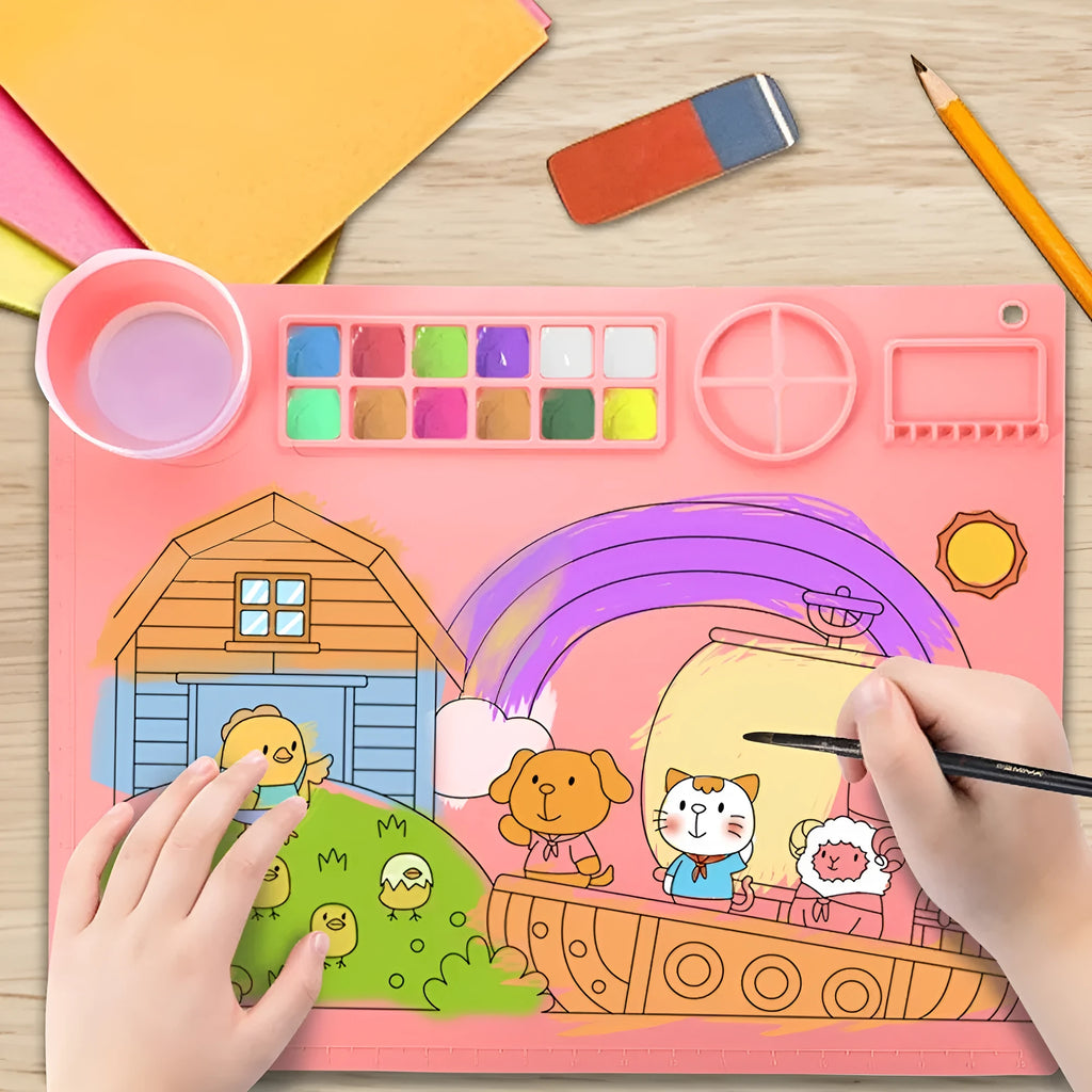 Light blue silicone painting mat with two integrated bowls for paint mixing, measuring 50cm by 40cm.