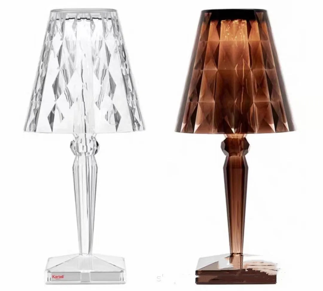 Rose gold portable touch projection night light with acrylic lamp holder on wooden surface