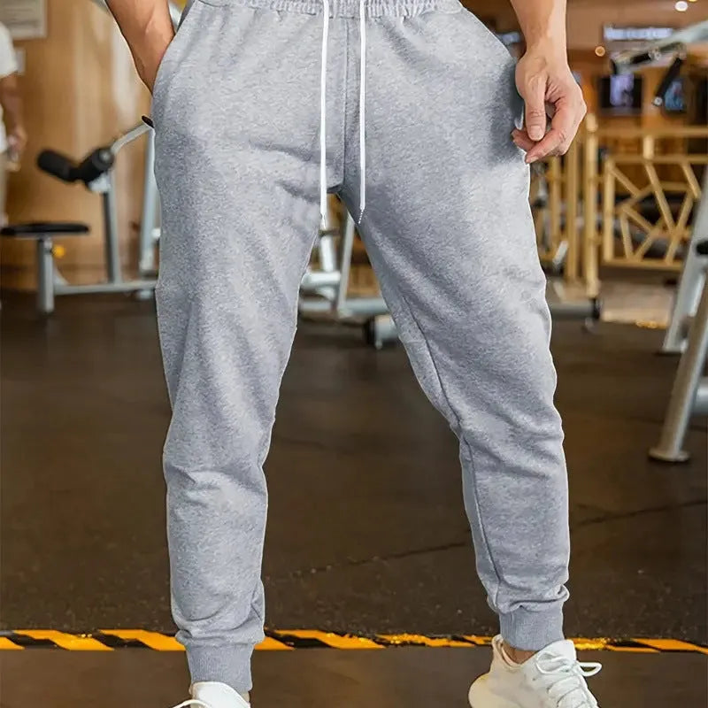 Men's loose-fitting linen-style leisure trousers with elastic drawstring waist in various sizes
