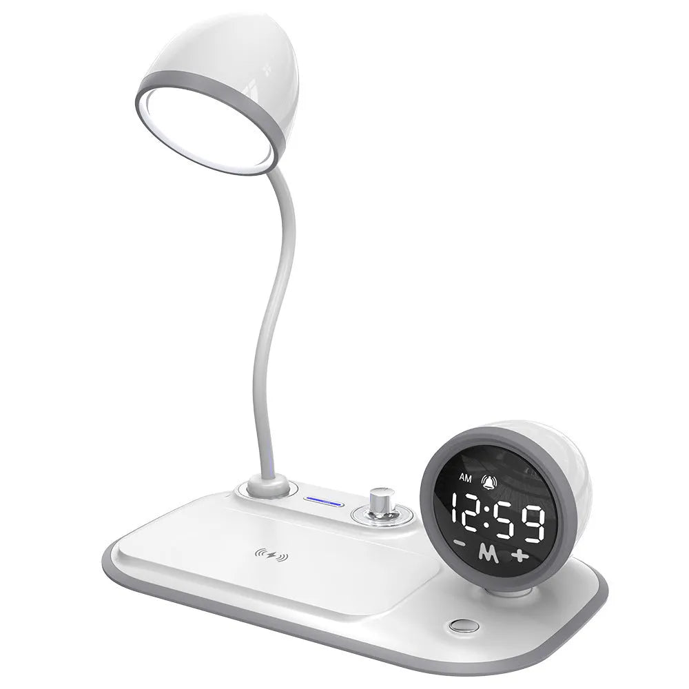White three-in-one desk lamp with LED lighting, digital clock display, and wireless charging pad on desktop