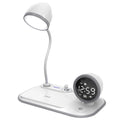 White three-in-one desk lamp with LED lighting, digital clock display, and wireless charging pad on desktop