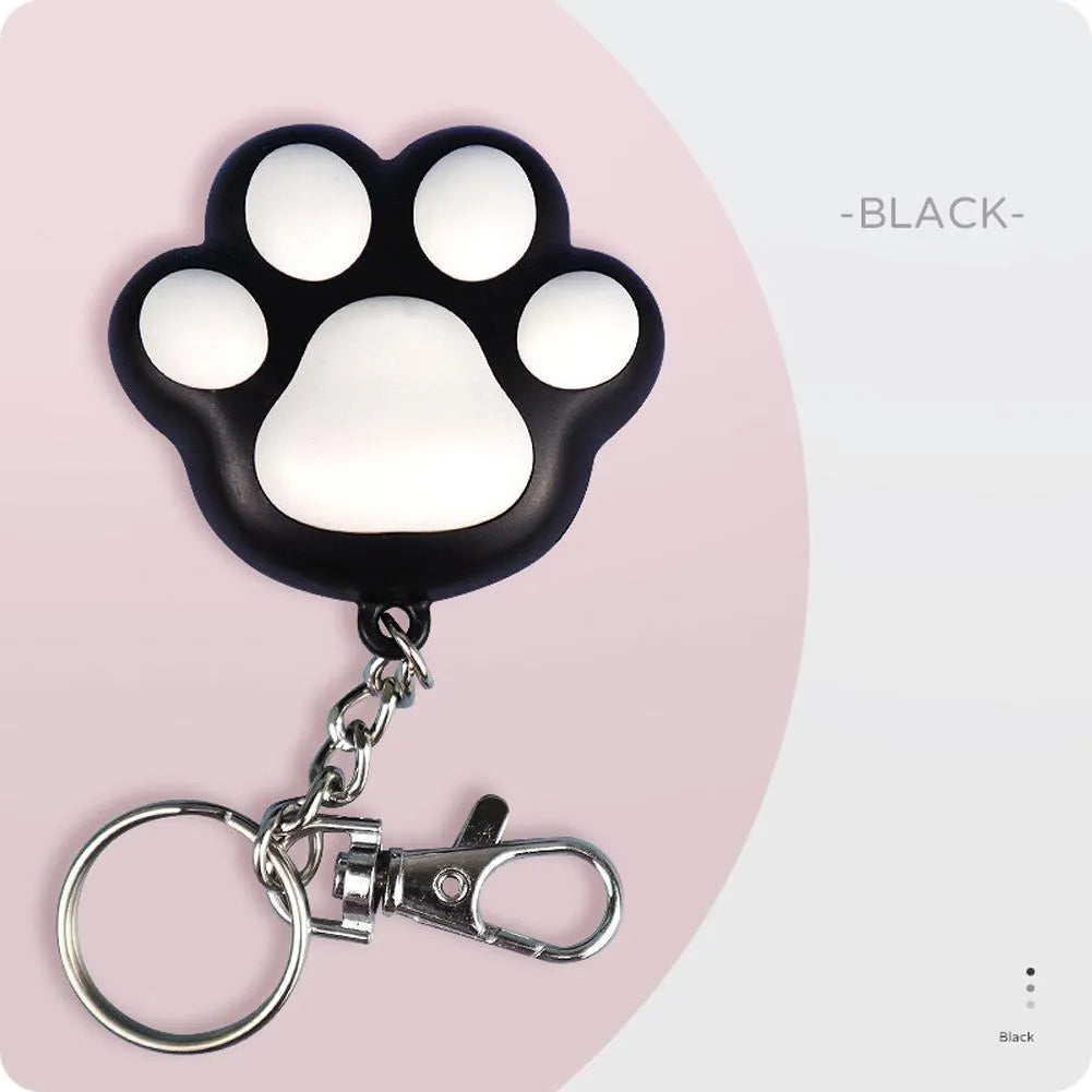 Pink and black rechargeable infrared cat teaser toy with keychain attachment showing 5cm dimensions
