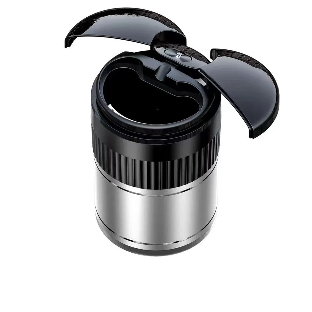 Compact metal car ashtray with lid in black, showing automatic sensor or touch controls.
