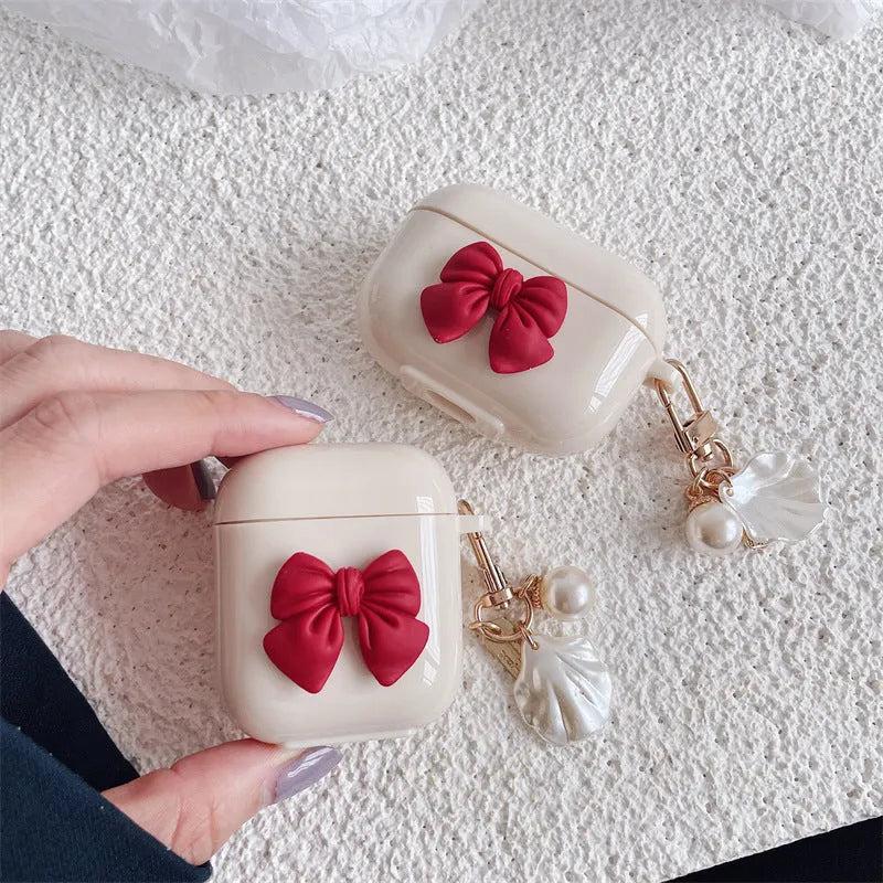 Beige red bow shell TPU case for AirPods wireless earbuds with clamshell design