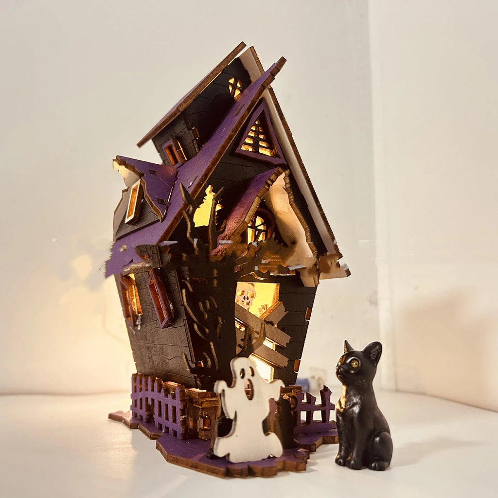 Wooden haunted house decoration with candlestick functionality measuring 14x10.5x19cm for Halloween table displays