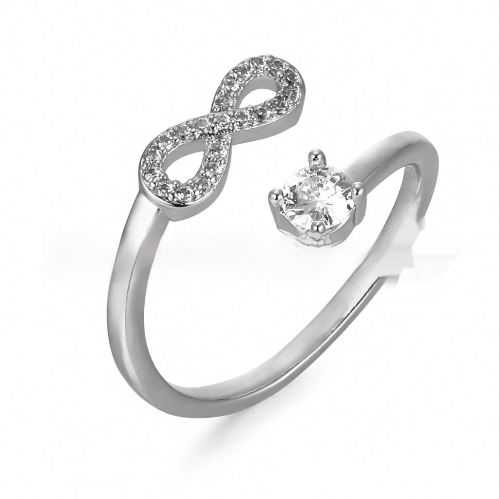 Geometric open band ring featuring a letter 'A' with inlaid zircon stones, shown in a rose gold finish.