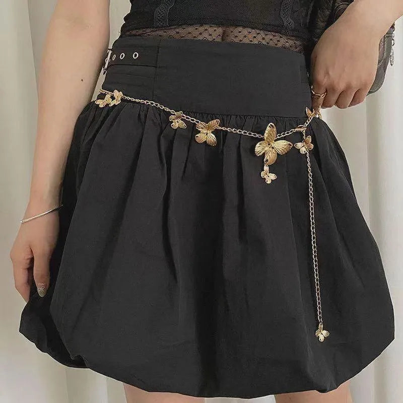 Gold or silver alloy butterfly waist chain measuring 104cm in length.