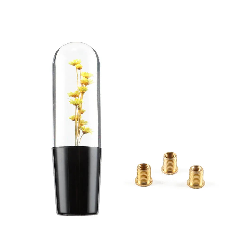 JDM crystal car gear knob with flower-in-water design, 15cm long, shown with three fitting adapters