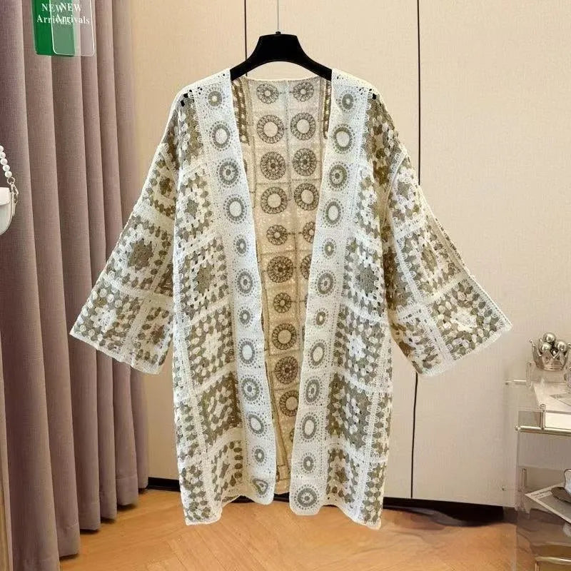 Ladies' loose embroidered thin knit cardigan in brown, front view on model
