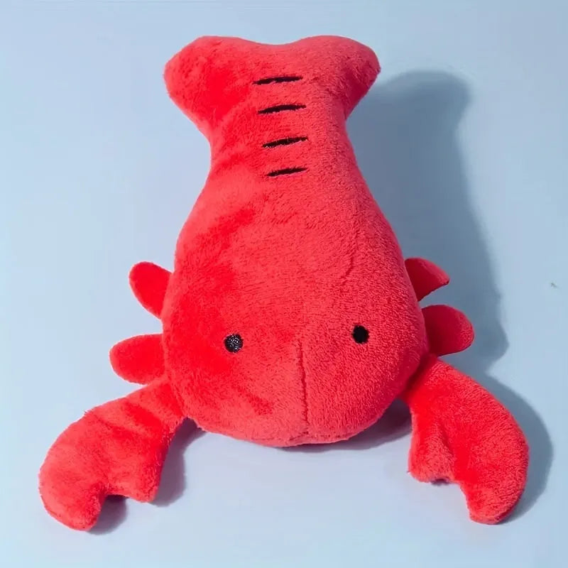Red lobster-shaped squeaky plush dog toy for small and medium breeds.