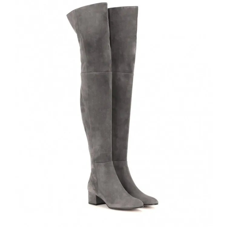 Grey women's flat over the knee suede boots with a pointed toe and low thick heel.