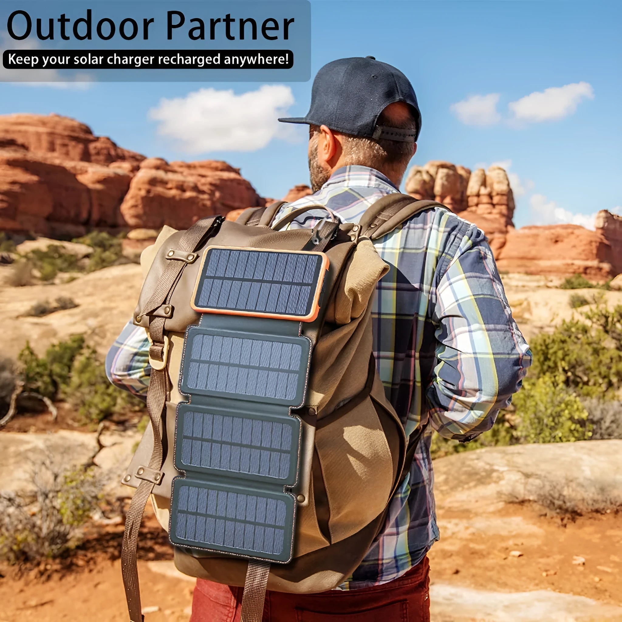 Black solar power bank with a solar panel, LED light, and soft leather exterior, shown outdoors.