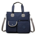 Women's nylon large-capacity crossbody bag in black with organised compartments and single shoulder strap