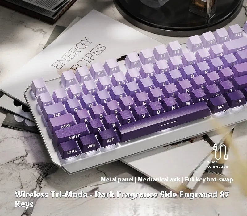 87 key wired mechanical keyboard with side engraved keycaps and white backlighting, compact design