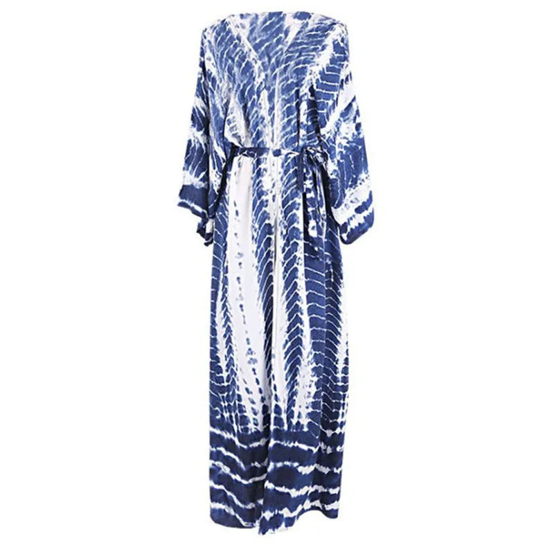 Printed loose cotton bikini cover-up blouse on hanger showing multiple DN0712 colour options.