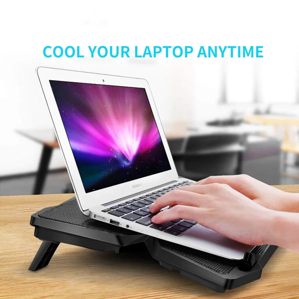 Blue laptop cooling pad with four illuminated fans and USB ports on adjustable base