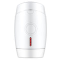 White home laser hair removal instrument with display, showing compact size and included adapter.