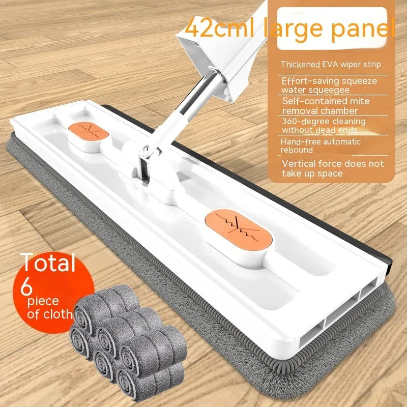 Large flat mop with stainless steel handle and blue cloth on hard floor