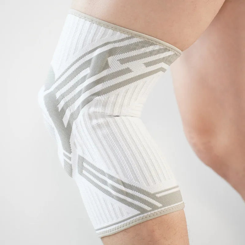 Blue, yellow, and grey high elasticity cotton knee pads for adult sports like basketball and running.