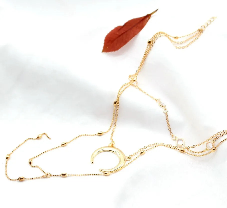 Gold silver multilayer crescent moon bead chain initial choker necklace on display with adjustable 35 cm chain and alloy finish