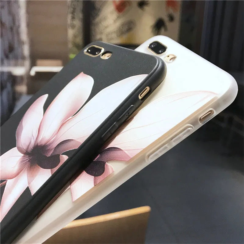 Embossed floral design on a black TPU iPhone case for iPhone 11.