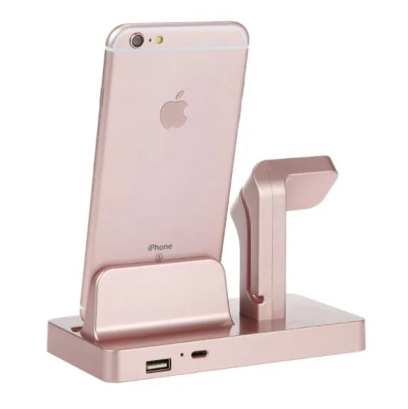 White 2-in-1 charging dock station holding an iPhone and an Apple Watch upright on a desk.