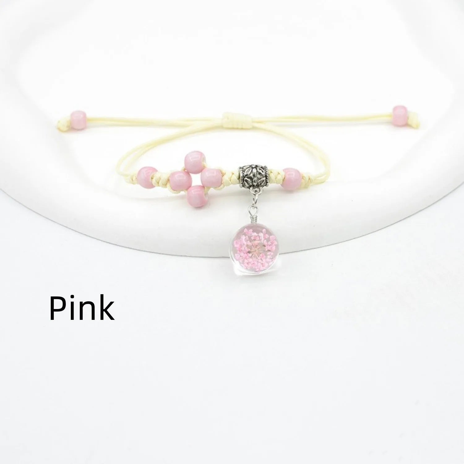 Glass bracelet with dried flowers inside 1.4cm beads on lace-style band in multiple colour options