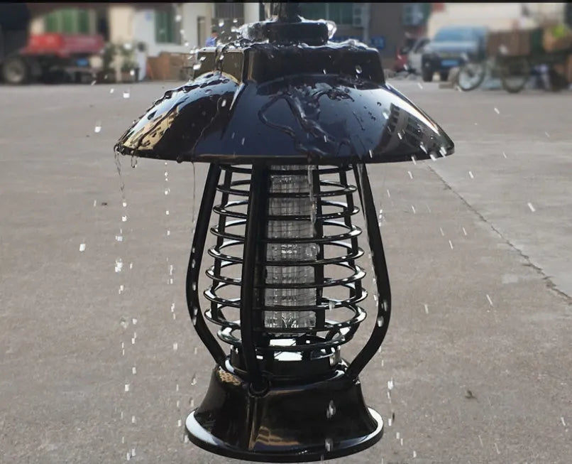 Black solar-powered mosquito lamp with solar panel on top and 24 LED lights for outdoor garden insect control.