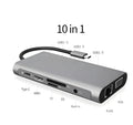 Grey USB-C to HDMI ten-in-one expansion dock with ports for 4K, VGA, Ethernet, USB 3.0, card readers, and audio jack